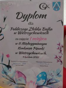 Zdjecie przedstawia Dyplom dla Publicznego Żłobka Bajka w Wietrzychowicach za zajęcie I miejsca w II Międzygminnym Konkursie Pisanki Wielkanocnej w Wietrzychowicach 4 kwietnia 2022
